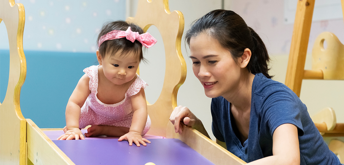 caregiver and toddler